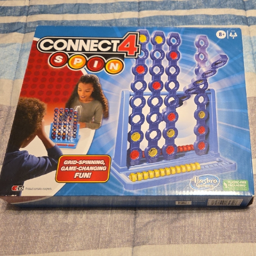 Hasbro Connect 4 Spin with Yellow and Red Discs
